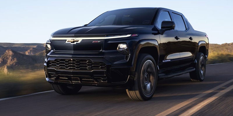 2024 Chevrolet Silverado 1500 EV driving on a highway