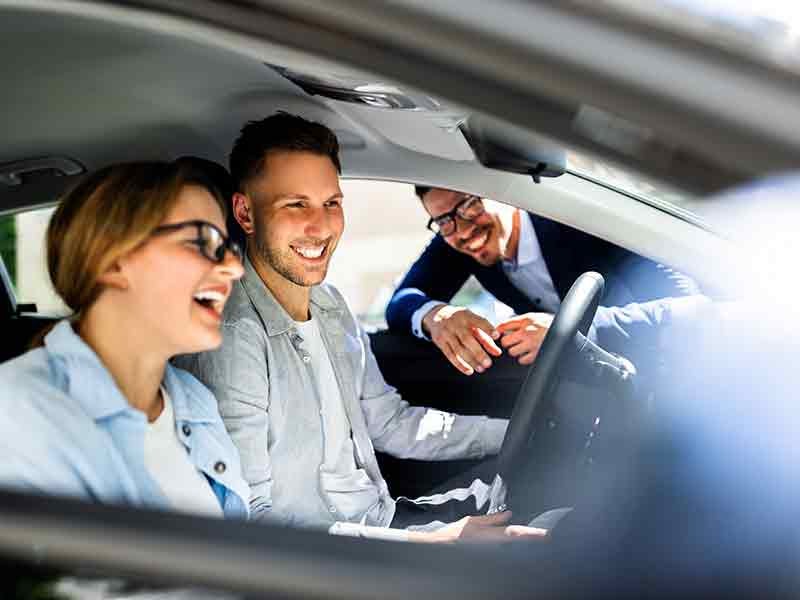 i.g. Burton Chevrolet of Berlin in Berlin MD couple in new car