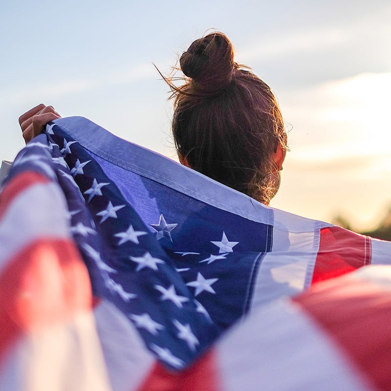 i.g. Burton Chevrolet of Berlin in Berlin MD woman flying american flag