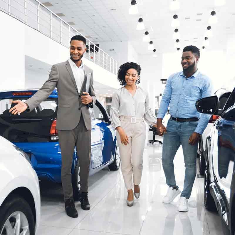 i.g. Burton Chevrolet of Berlin in Berlin MD couple looking at new cars