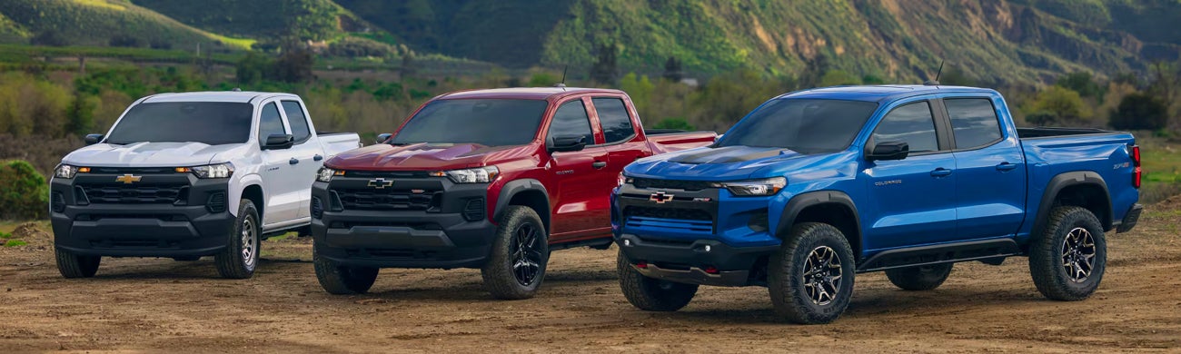 Three Chevrolet Colorado trucks side by side